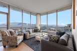Experience breathtaking views from this stunning condo with floor-to-ceiling windows.