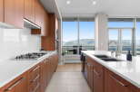 Experience luxury living in this stunning kitchen with breathtaking mountain views.