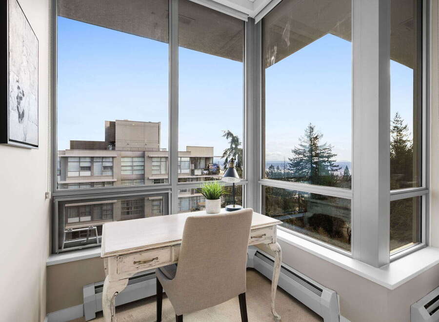 Enjoy breathtaking views from this stunning property! This home features a bright and airy workspace with large windows, perfect for working from home.