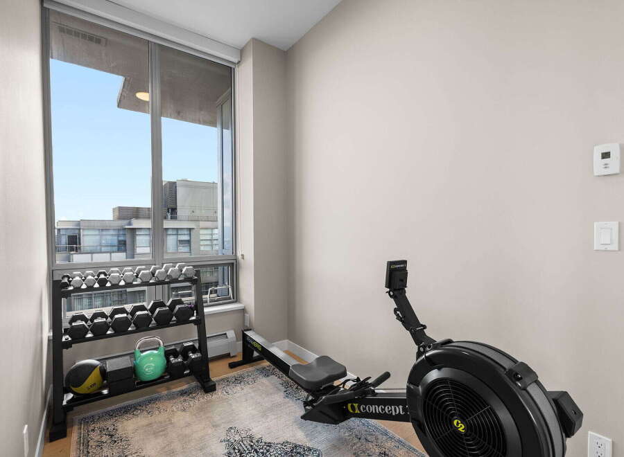 This modern home gym offers a perfect blend of fitness and luxury.