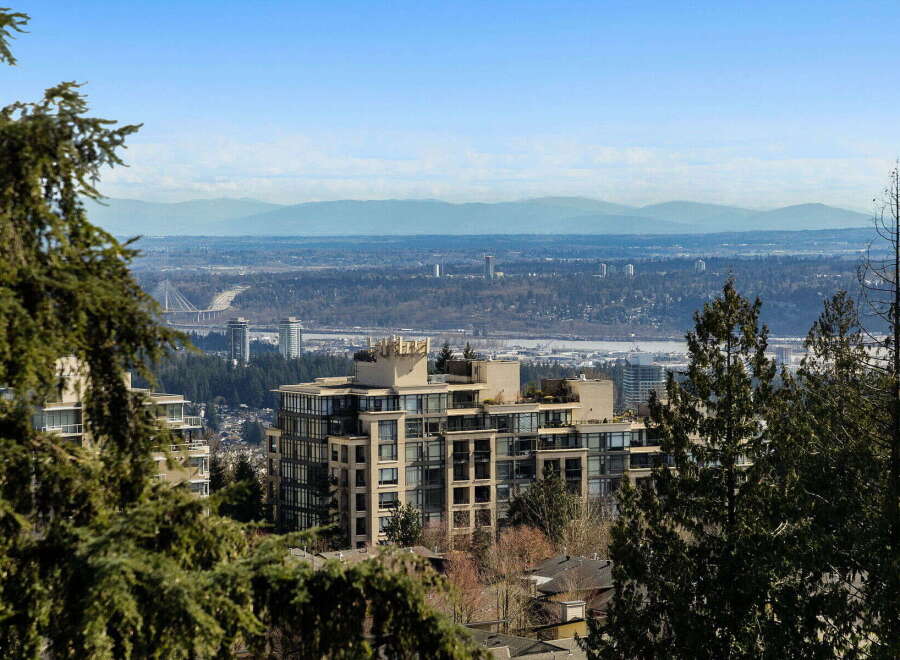 Experience breathtaking views from this luxurious property, showcasing a modern architectural design.