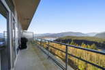 Enjoy breathtaking views from this stunning property! This home features a spacious balcony, perfect for relaxing and taking in the surrounding natural beauty.