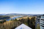 Experience breathtaking views from this stunning property! This home offers panoramic vistas of the mountains, water, and city skyline.
