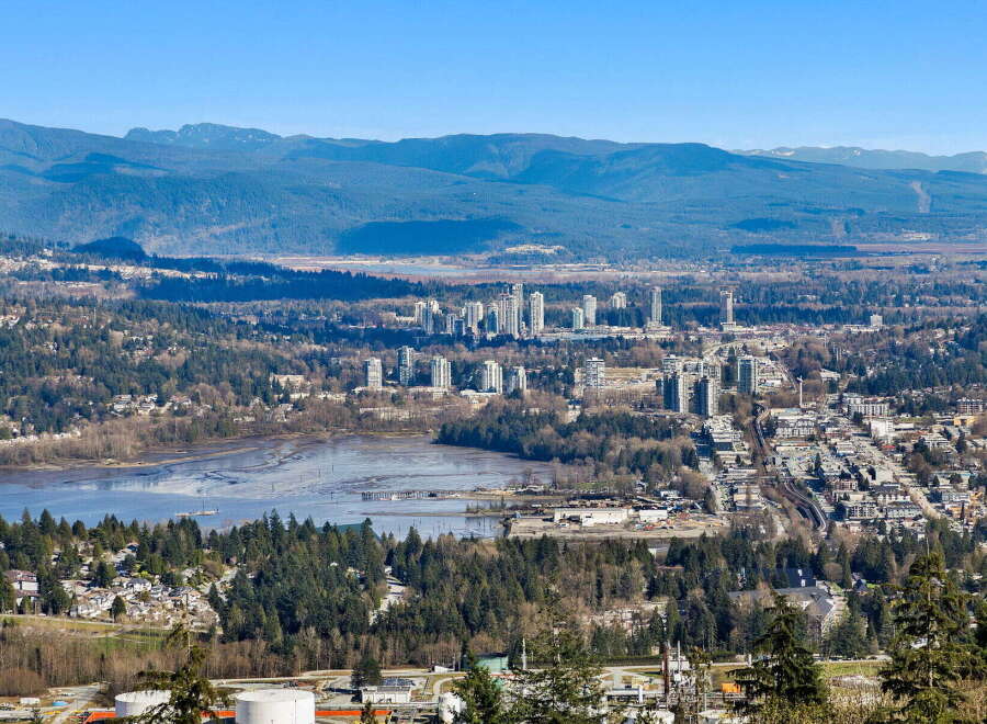 Experience breathtaking views of the city and surrounding mountains from this stunning property.