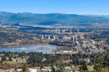 Experience breathtaking views of the city and surrounding mountains from this stunning property.