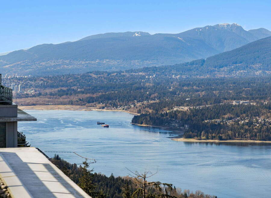 Experience unparalleled views from this stunning property, offering a serene escape with breathtaking vistas of the water and majestic mountains.