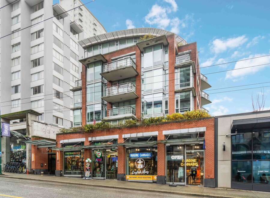 Discover modern urban living in this vibrant building featuring a mix of residential and commercial spaces.