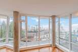 Experience breathtaking views from this stunning corner unit, featuring floor-to-ceiling windows that flood the space with natural light.