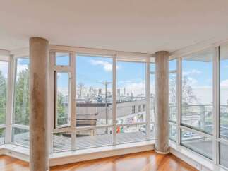 Experience breathtaking views from this stunning corner unit, featuring floor-to-ceiling windows that flood the space with natural light.