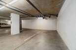 Discover this spacious parking spot in a secure underground garage, perfect for protecting your vehicle from the elements.