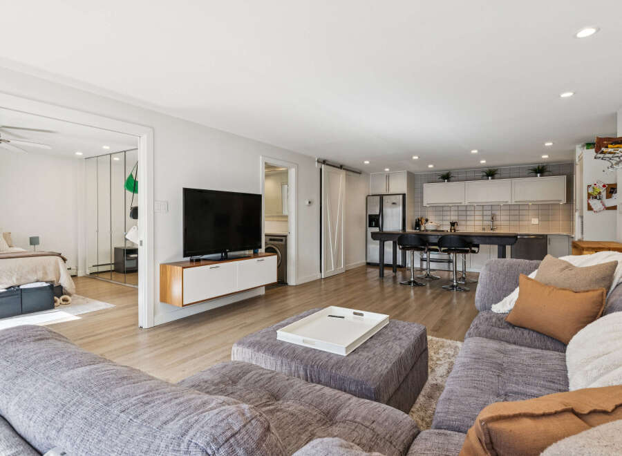 Step into modern living with this stunning property, featuring a spacious open-concept design perfect for entertaining.
