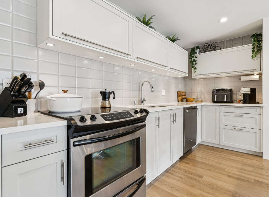 This stunning kitchen boasts modern design and functionality.