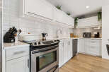 This stunning kitchen boasts modern design and functionality.