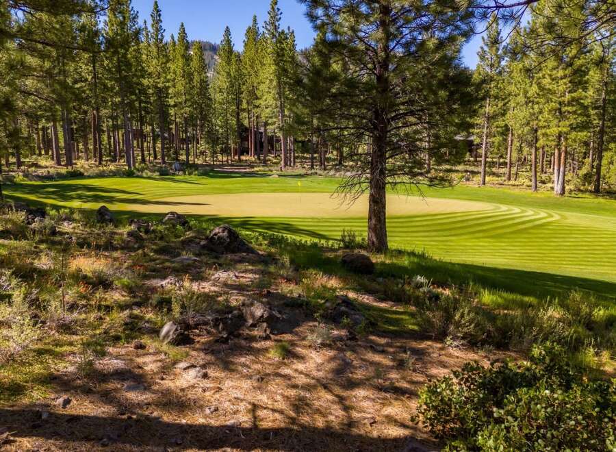 Discover the tranquility of this stunning golf course property, nestled amidst a lush, green landscape.