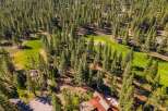 Discover the tranquility of this stunning property nestled amidst a lush forest and a meticulously maintained golf course.