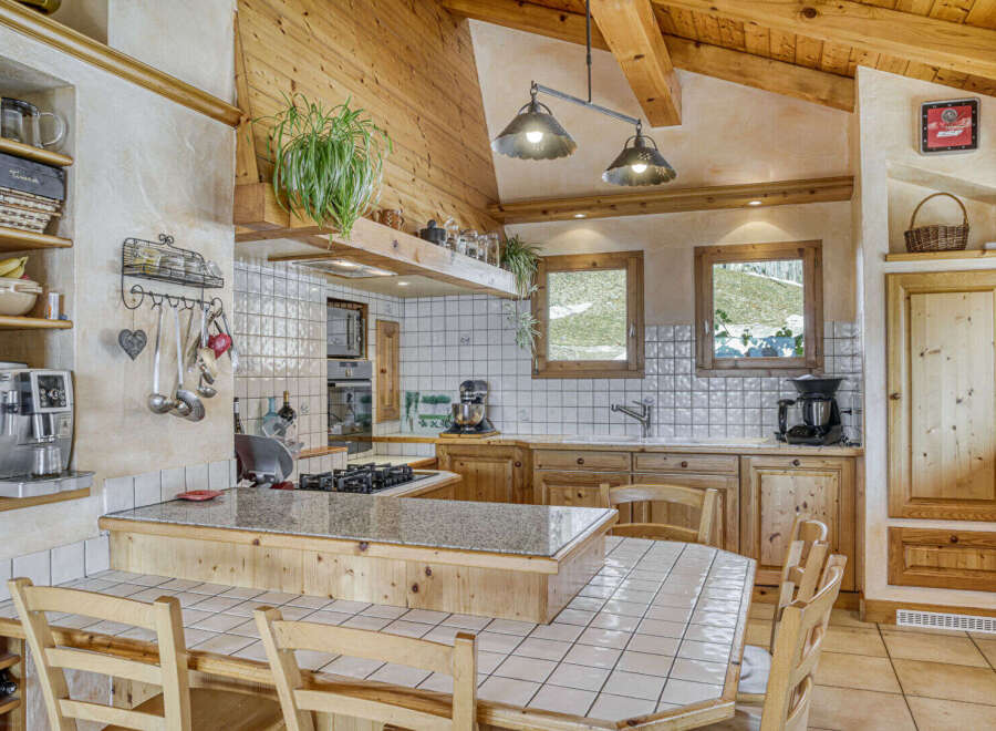 Step into this charming kitchen, a perfect blend of rustic elegance and modern convenience.