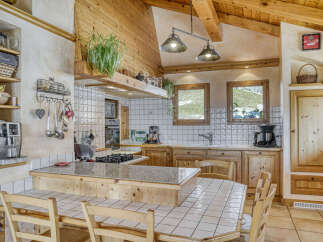 Step into this charming kitchen, a perfect blend of rustic elegance and modern convenience.