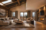Experience cozy mountain living in this stunning chalet living room, featuring a large sectional sofa, a rustic stone fireplace, and expansive windows showcasing a winter wonderland.