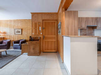 Step into this charming property featuring a warm and inviting interior.