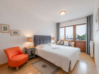 Discover the charm of this inviting bedroom, perfect for a cozy retreat.