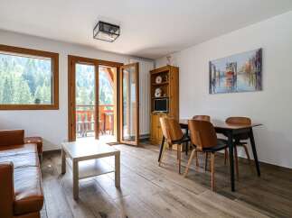 This charming property boasts a bright and airy living space, perfect for relaxation and entertaining.