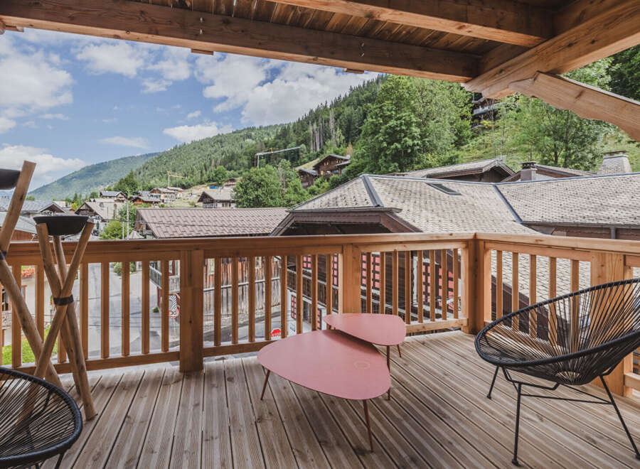 Enjoy breathtaking mountain views from this stunning balcony.