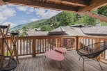 Enjoy breathtaking mountain views from this stunning balcony.