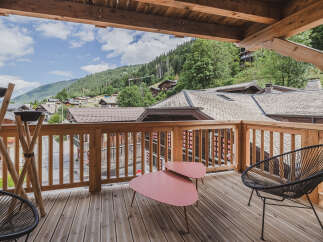 Enjoy breathtaking mountain views from this stunning balcony.