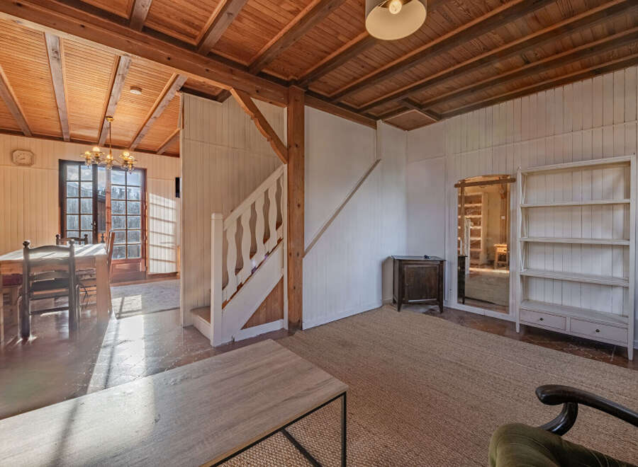 Step into this charming property with a warm and inviting interior.
