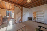 Step into this charming property with a warm and inviting interior.
