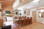 This charming property boasts a spacious open-plan layout, perfect for entertaining and family gatherings.