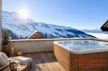 Enjoy breathtaking mountain views from this luxurious property.