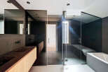 Step into modern luxury with this stunning bathroom design.