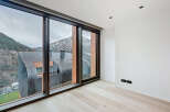 Experience breathtaking mountain views from this modern property.