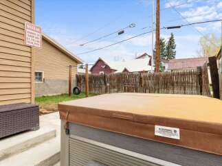 Enjoy the tranquility of this property, featuring a relaxing hot tub perfect for unwinding after a long day.