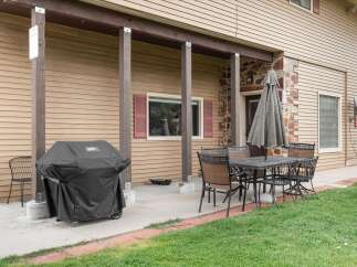 Enjoy outdoor living at its finest with this charming property! Featuring a covered patio, perfect for entertaining or relaxing.