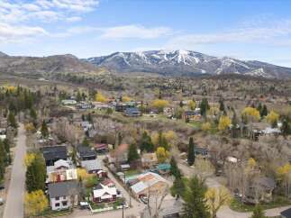 Nestled in a picturesque mountain town, this property offers stunning views and a serene atmosphere.