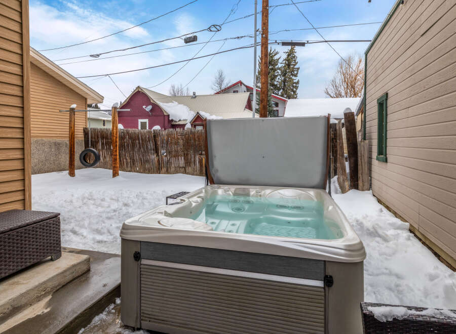 Enjoy the ultimate relaxation experience in this stunning property featuring a luxurious hot tub.