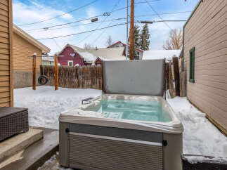 Enjoy the ultimate relaxation experience in this stunning property featuring a luxurious hot tub.