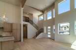This stunning property boasts a modern interior with soaring ceilings and an open floor plan, perfect for entertaining.