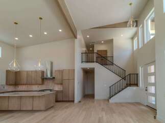 Step into luxury with this stunning modern home! Featuring a spacious open floor plan, this property boasts a gourmet kitchen with high-end appliances and a large island, perfect for entertaining.
