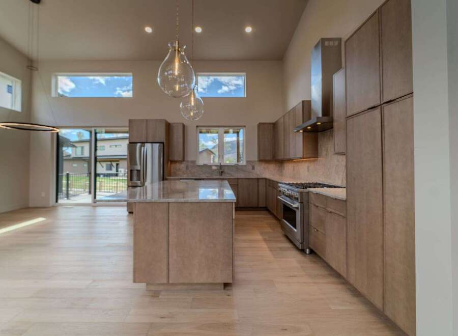 This stunning kitchen boasts a modern design with high-end finishes.