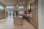This stunning kitchen boasts a modern design with high-end finishes.