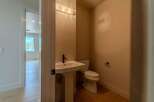 Step into this beautifully designed powder room, perfect for guests.