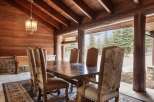 Step into rustic elegance with this stunning dining area.