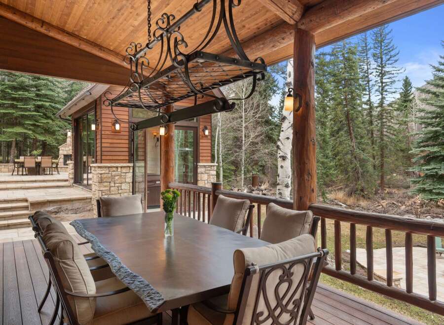 Enjoy the tranquility of nature from this stunning outdoor space.