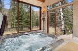 Indulge in luxury with this stunning property featuring a private hot tub, perfect for relaxation and rejuvenation.