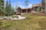 This stunning property boasts a luxurious outdoor living space, perfect for entertaining or relaxing.
