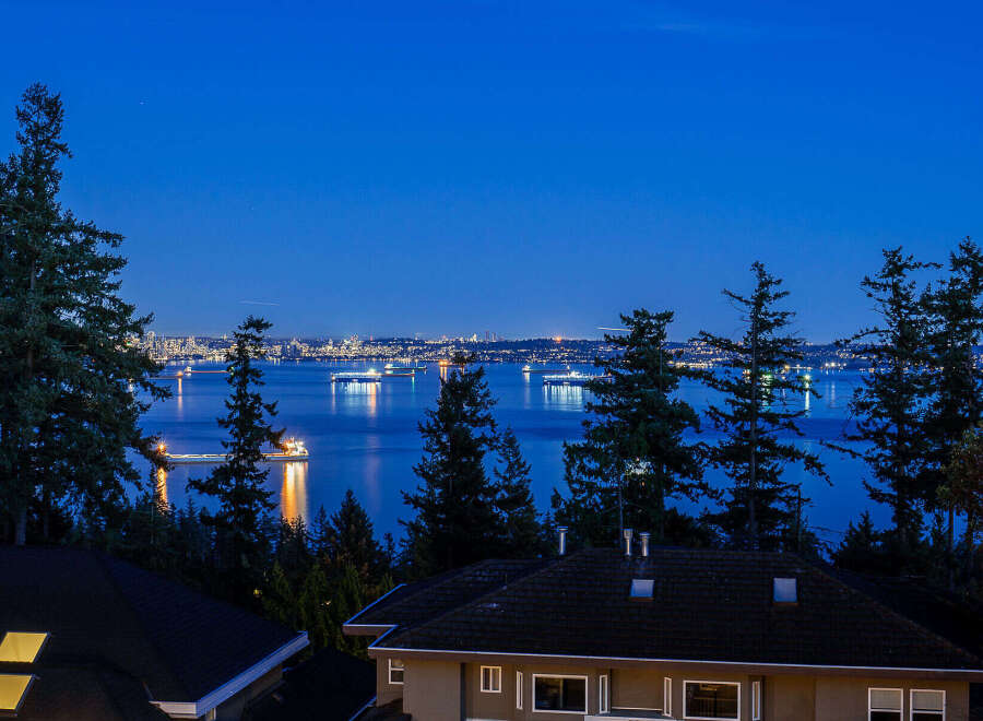 Enjoy breathtaking views from this stunning property! This home offers a serene escape with its proximity to the water and lush greenery.