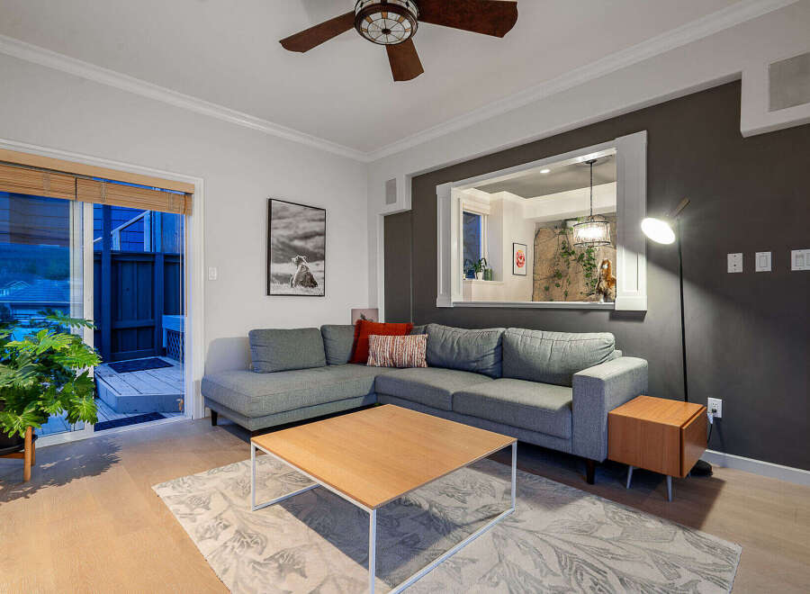 Step into this inviting living space, perfect for relaxation and entertaining.